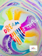 Load image into Gallery viewer, Rainbow Dream Cloud bath bomb scented in slam bar fragranced (sweet and fruity), hand painted with hidden colour inside.