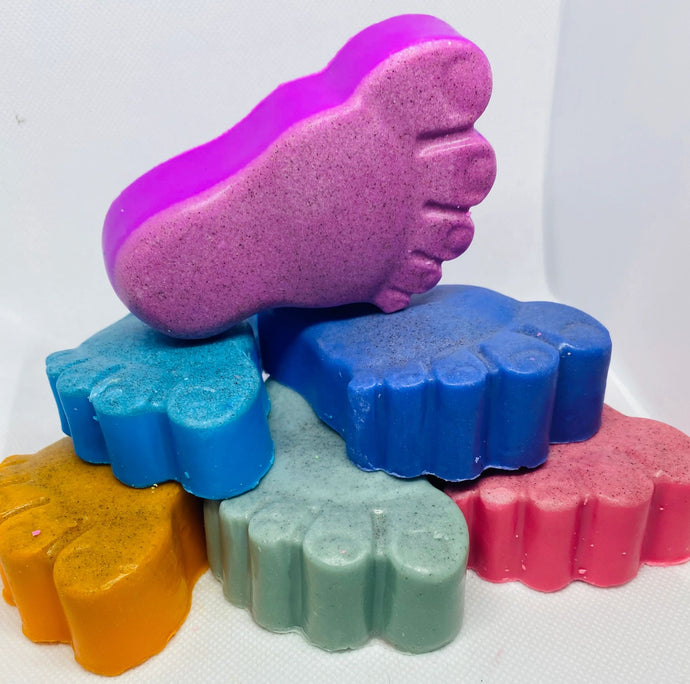 Scrubby foot Buddy bar  This lovely chunky scrubby buddy bar is sure to keep your feet smelling fresh and looking great too! Packet with grounded Pumice stone to scrub away dead or hard skin and lashings of our scented smelling fragrances.  approx 100g