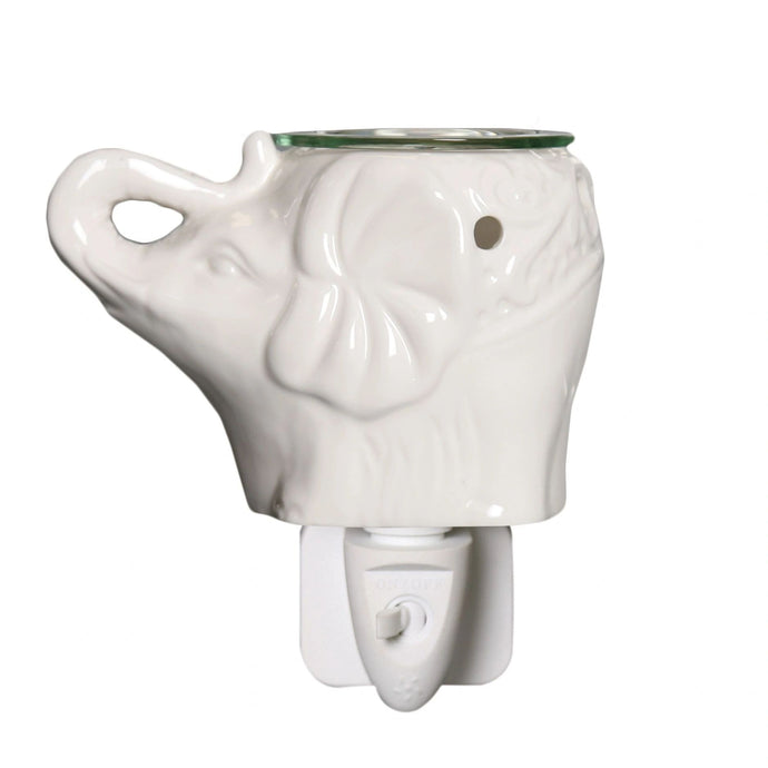 white Elephant Ceramic plug in lamp   Wax Melt Burner Plug In - Ceramic Elephant 10cm  Supplied in a picture box with 2 glass bowls and 2 bulbs  For best results use with our softer wax melts