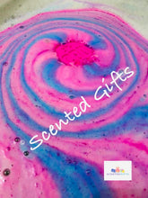 Load image into Gallery viewer, CBD bath bomb 100mg CBD isolate bath bombs with HIDDEN embeds for bath art. CBD 100MG RASPBERRY BATH BOMB. Coloured in pink with pink and lue embeds.