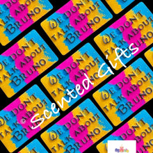 Load image into Gallery viewer, We don’t talk about… bath bomb A rainbow layered coloured block inspired phrase shaped bath bomb scented in RHUBARB & PINK MELON COOLER