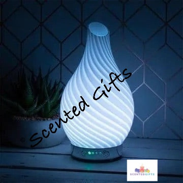 Aroma Humidifier Diffuser  UK Mains Powered Humidifier With white twist Beautiful Design.  Simply Add Water And Oil To The Tank And See It Quickly Vaporise Into a Cool, Dry Scented Mist Auto Timer Shut Off Feature.