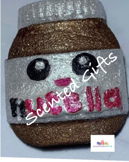 Bella Nutella Bath Bomb Add some fun to your bath with these large handcrafted Bath Bombs that explode releasing a burst of colours and sweet fragrance of bubblegum. A nutella shaped bath bomb airbrush and hand painted.