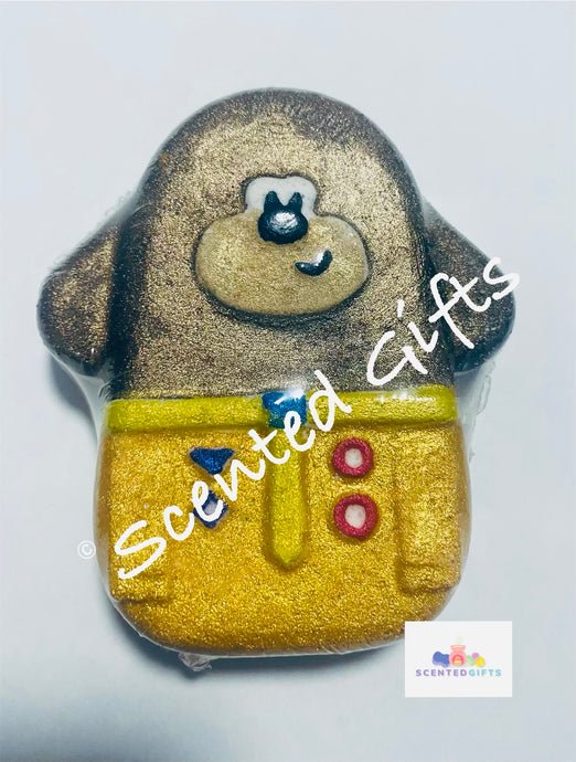 Duggie Bath Bomb  Kids favourite cartoon favourite Duggie a friendly brown dog shaped bath bomb with hand painted detail and scented in strawberry  