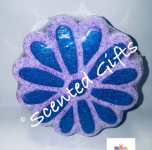 Load image into Gallery viewer, Purple Daisy bath bomb A purple coloured daisy flower shaped bath bomb with coloured hidden embeds and scented in bedtime bath.