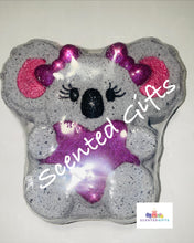 Load image into Gallery viewer, Kylie Koala Bath Bomb A grey koala bomb with hidden pink, purple and yellow centre. Fragranced in joyous