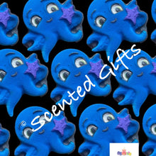 Load image into Gallery viewer, Olly Octopus bath bomb A blue shaped octopus with mica detail and scented in BLUE RASPBERRY SLUSH.