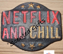 Load image into Gallery viewer, Netflix and Chill Bath Bomb  A black shimmer airbrushed plaque shaped bath bomb with raised text ‘Netflix and chill’ hand painted details and coloured bath bomb scented in coco mango.
