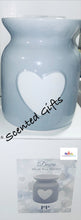 Load image into Gallery viewer, This sleek grey toned, ceramic wax warmer features a charming white heart design and added dipped top for wax/oil melting.  This stunning wax warmer would make the perfect gift for someone who loves wax melts and oils, or a treat for yourself. Size approx, 11x11x14cm
