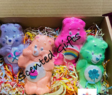 Load image into Gallery viewer, Care Bear Bath Bombs  A super cute collection of care bear bath bombs each in different glittery airbrushed coloured designs, with hidden embeds and scents. 
