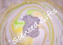 Load image into Gallery viewer, Cyril Squirrel   A Grey squirrel bomb with hidden orange yellow and green centre fragranced in rhubarb and custard.
